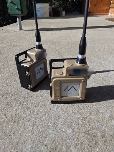 Two rugged handheld mesh nodes with antennas